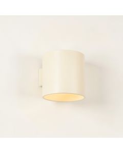 Stone Crest Wall Sconce Mounted On A Plain Wall - Ivory (synthetic illustration; no displayed measurements)