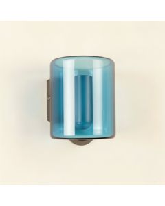 Wren Bluff Wall Sconce Mounted On A Plain Wall - Blue (synthetic illustration; no displayed measurements)