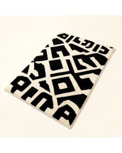 Stach Geometric Tufted Wool Black/Cream Area Rug (synthetic illustration; no displayed measurements)