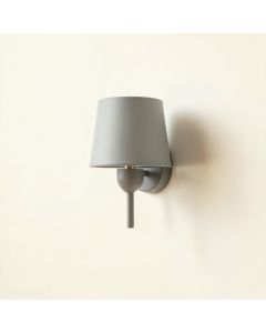 Stone Brook Wall Sconce Mounted On A Plain Wall - Gray (synthetic illustration; no displayed measurements)