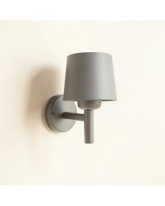 Cliff Crest Wall Sconce Mounted On A Plain Wall - Gray (synthetic illustration; no displayed measurements)