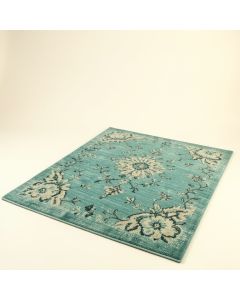 Leonora Bohemian Textured Weave Floral Indoor/Outdoor Teal Area Rug (synthetic illustration; no displayed measurements)
