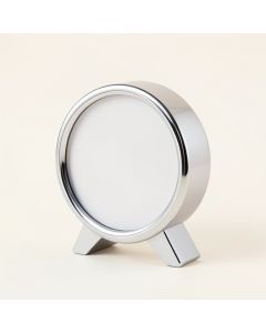 Chrome Clock And Thermometer (synthetic illustration; no displayed measurements)