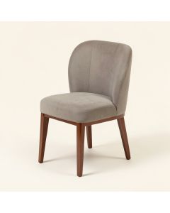 Malik Dual Tone Curved Saddle Upholstered Dining Chair (synthetic illustration; no displayed measurements)