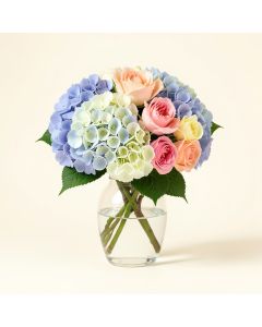 Hydrangea And Rose Floral Arrangement In Glass Vase (synthetic illustration; no displayed measurements)