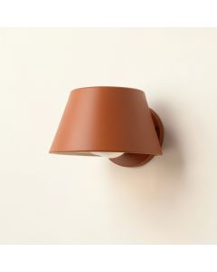 Laurel Bluff Wall Sconce Mounted On A Plain Wall - Terracotta (synthetic illustration; no displayed measurements)