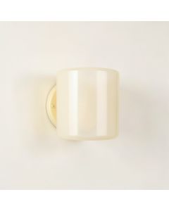 Stone Canyon Wall Sconce Mounted On A Plain Wall - Ivory (synthetic illustration; no displayed measurements)