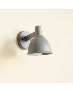 Slate Bend Wall Sconce Mounted On A Plain Wall - Gray (synthetic illustration; no displayed measurements)