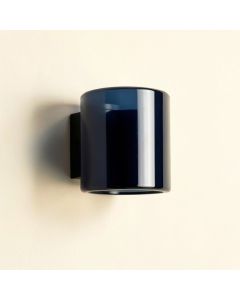 Olive Crest Wall Sconce Mounted On A Plain Wall - Navy (synthetic illustration; no displayed measurements)