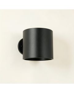 Hazel Bluff Wall Sconce Mounted On A Plain Wall - Black (synthetic illustration; no displayed measurements)