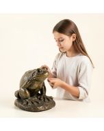 Girl Looking At A Frog Statue (synthetic illustration; no displayed measurements)