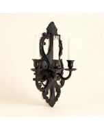 Ornate Iron Wall Sconce (synthetic illustration; no displayed measurements)